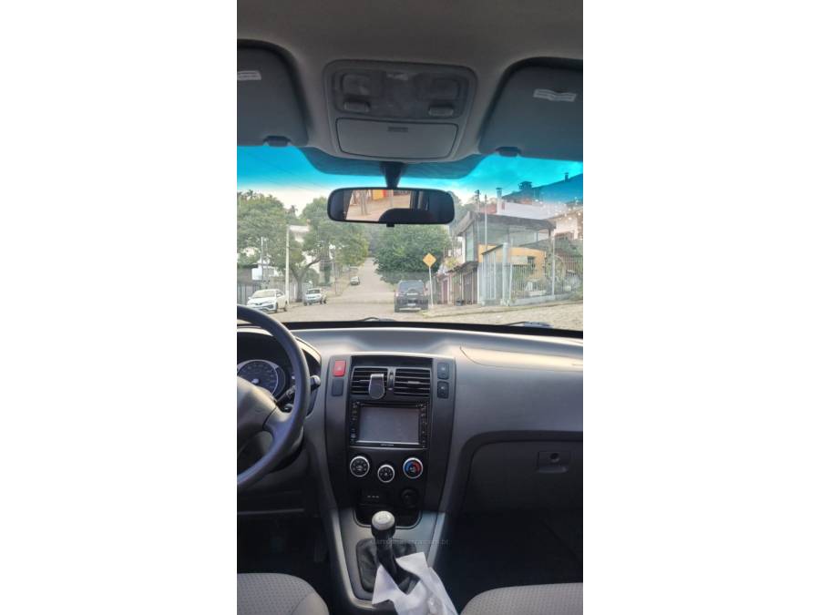 HYUNDAI - TUCSON - 2010/2011 - Bege - R$ 39.900,00