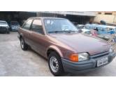 FORD - ESCORT - 1986/1987 - Marrom - R$ 16.900,00