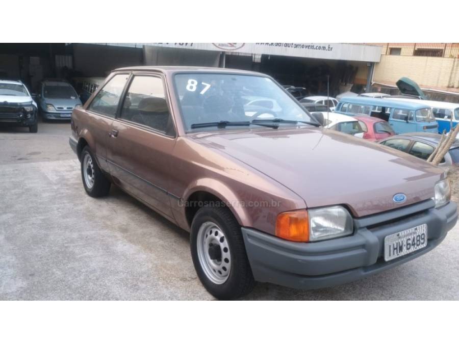 FORD - ESCORT - 1986/1987 - Marrom - R$ 16.900,00